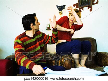 Couple fighting, man raising hand, woman protecting self with arms View Large Photo Image Stock Photograph - Couple fighting, man raising hand, woman protecting self with arms. Fotosearch