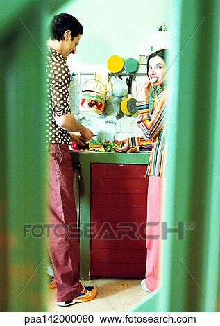 Couple in kitchen. View Large Photo Image Stock Image - Couple in kitchen.. Fotosearch