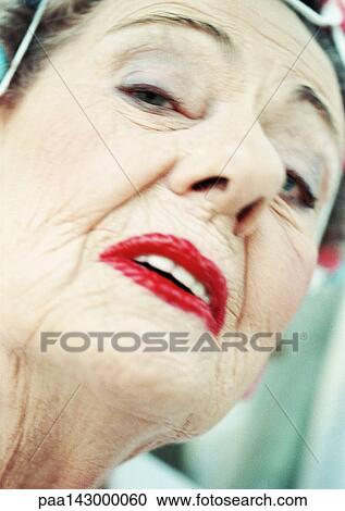 Elderly woman looking at camera, portrait, extreme close-up View Large Photo Image Stock Image - Elderly woman looking at camera, portrait, extreme close-up. Fotosearch