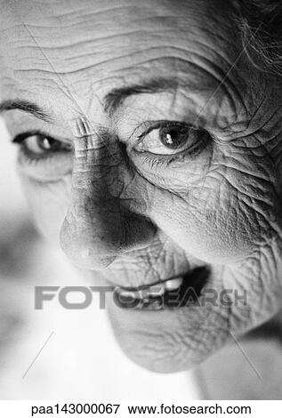 Stock Photo - Elderly woman, portrait, close-up, b&w. Fotosearch