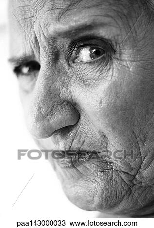 Elderly woman raising eyebrow, looking at camera, portrait, close-up, b&w View Large Photo Image Stock Image - Elderly woman raising eyebrow, looking at camera, portrait, close-up, b&w. Fotosearch