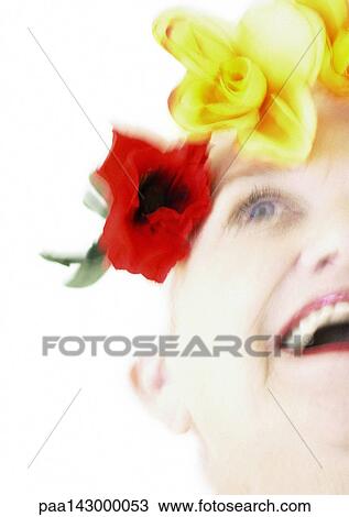 Elderly woman with flowers on head, low angle view, blurred View Large Photo Image Stock Image - Elderly woman with flowers on head, low angle view, blurred. Fotosearch