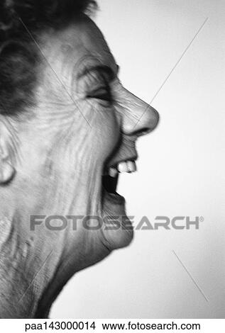 Elderly woman with mouth wide open, side view, close-up, b&w View Large Photo Image Picture - Elderly woman with mouth wide open, side view, close-up, b&w. Fotosearch