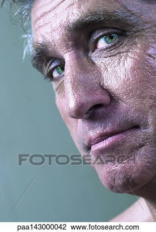 Mature man looking at camera, portrait, close-up View Large Photo Image Stock Image - Mature man looking at camera, portrait, close-up. Fotosearch