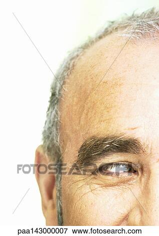Mature man looking to the side, partial view, close-up View Large Photo Image Stock Photo - Mature man looking to the side, partial view, close-up. Fotosearch