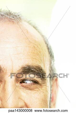 Mature man looking to the side, partial view, close-up View Large Photo Image Stock Photo - Mature man looking to the side, partial view, close-up. Fotosearch