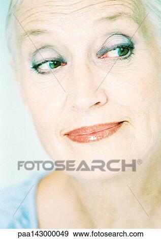 Mature woman looking to the side, close-up, portrait View Large Photo Image Stock Photo - Mature woman looking to the side, close-up, portrait. Fotosearch