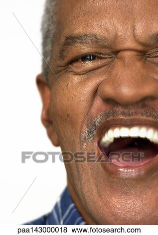Senior man laughing, partial view, close-up View Large Photo Image Stock Photo - Senior man laughing, partial view, close-up. Fotosearch