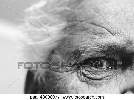 Senior man's eye, extreme close-up, b&w View Large Photo Image Stock Photo - Senior man's eye, extreme close-up, b&w. Fotosearch