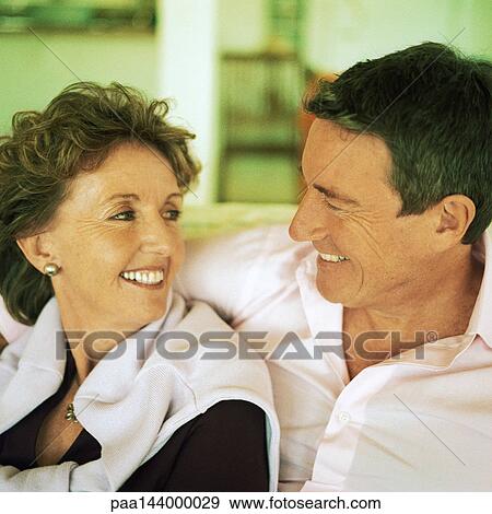 Mature couple smiling View Large Photo Image Stock Photo - Mature couple smiling. Fotosearch