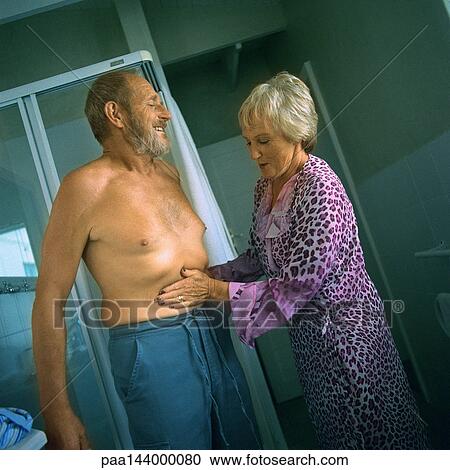 Mature woman touching man's bare stomach View Large Photo Image Stock Image - Mature woman touching man's bare stomach. Fotosearch