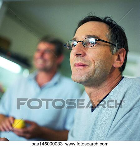 Mature man, second man in background, portrait View Large Photo Image Stock Image - Mature man, second man in background, portrait. Fotosearch