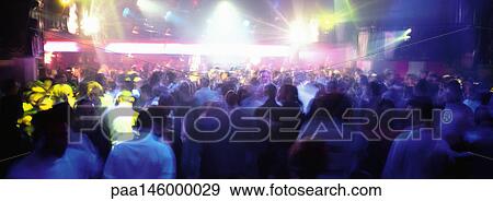 Stock Photo - Crowd in concert hall. Fotosearch