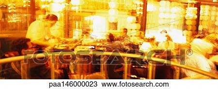 People sitting in cafe, blurred View Large Photo Image Stock Image - People sitting in cafe, blurred. Fotosearch