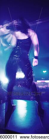 Person dancing in nightclub, rear view View Large Photo Image Stock Image - Person dancing in nightclub, rear view. Fotosearch