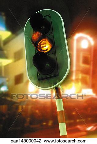 Euro sign on yellow traffic light. View Large Illustration Drawing - Euro sign on yellow traffic light.. Fotosearch
