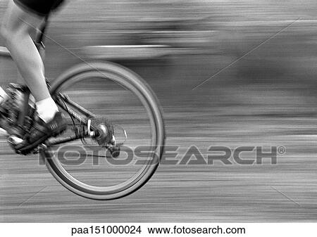 Man cycling, side view, low section, b&w. View Large Photo Image Picture - Man cycling, side view, low section, b&w. . Fotosearch