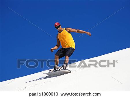 Man snowboarding, low angle view. View Large Photo Image Stock Image - Man snowboarding, low angle view.. Fotosearch