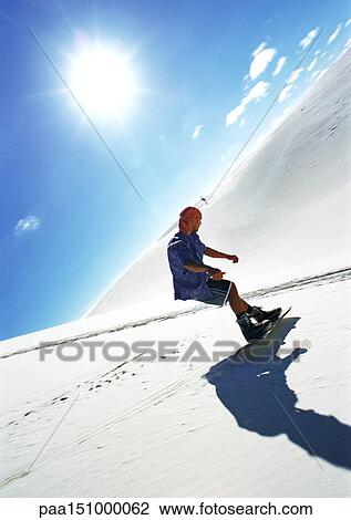 Man snowboarding. View Large Photo Image Stock Image - Man snowboarding.. Fotosearch