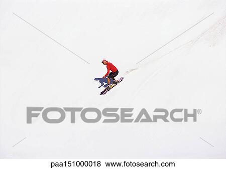 Stock Photo - Man snowboarding.. Fotosearch