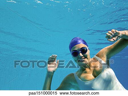 Woman smiling underwater, underwater view. View Large Photo Image Stock Photography - Woman smiling underwater, underwater view.. Fotosearch