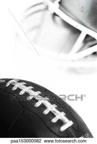 Football and helmet, close-up, b&w. View Large Photo Image Stock Image - Football and helmet, close-up, b&w.. Fotosearch