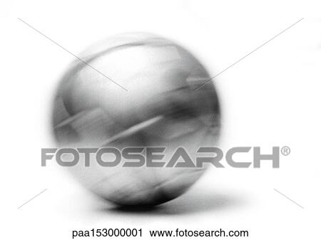 Stock Image - Soccer ball, close-up, blurred, b&w.. Fotosearch