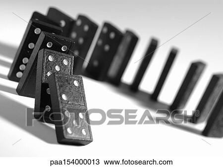 Falling dominoes, b&w. View Large Photo Image Stock Image - Falling dominoes, b&w.. Fotosearch