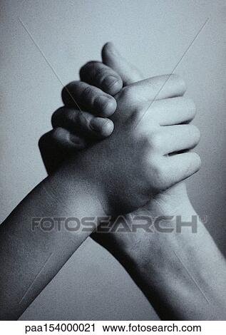 Hands clasped, b&w. View Large Photo Image Stock Image - Hands clasped, b&w.. Fotosearch