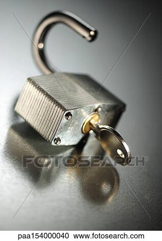 Key in padlock. View Large Photo Image Stock Image - Key in padlock.. Fotosearch