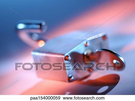 Padlock and key, blurred. View Large Photo Image Stock Photo - Padlock and key, blurred.. Fotosearch