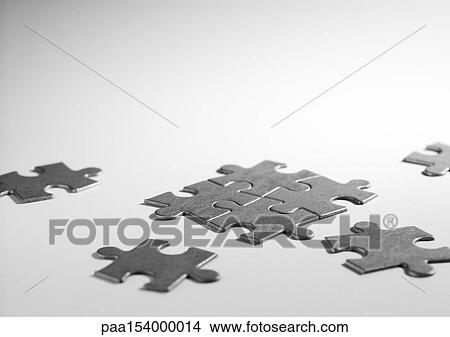 Pieces of jigsaw puzzle, b&w. View Large Photo Image Picture - Pieces of jigsaw puzzle, b&w.. Fotosearch