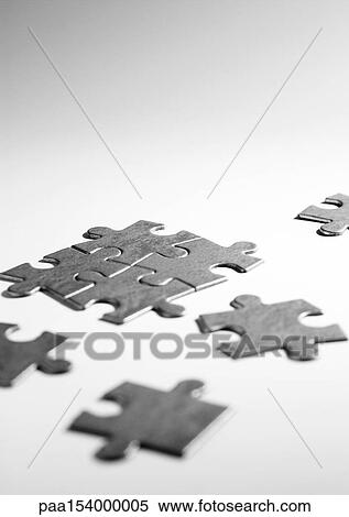 Pieces of puzzle, b&w. View Large Photo Image Stock Photography - Pieces of puzzle, b&w.. Fotosearch