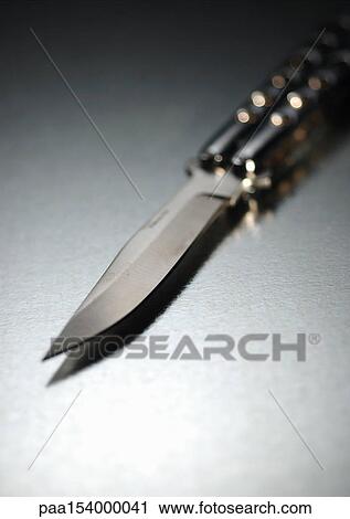 Pocket knife, blurred. View Large Photo Image Stock Image - Pocket knife, blurred.. Fotosearch