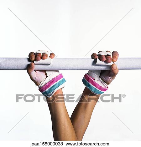 Female gymnast grasping bar, close-up. View Large Photo Image Stock Photo - Female gymnast grasping bar, close-up.. Fotosearch