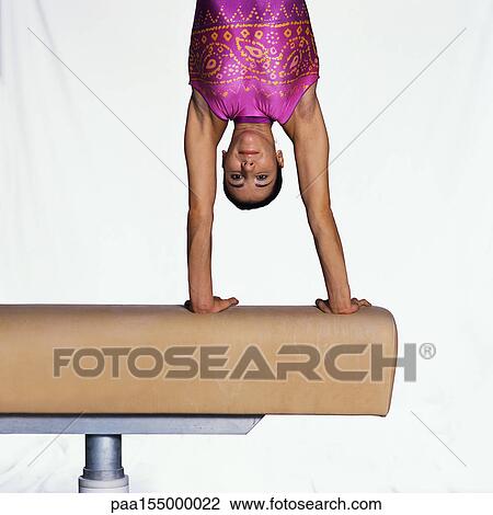 Female gymnast on pommel horse, upside down, upper section. View Large Photo Image Stock Image - Female gymnast on pommel horse, upside down, upper section. . Fotosearch