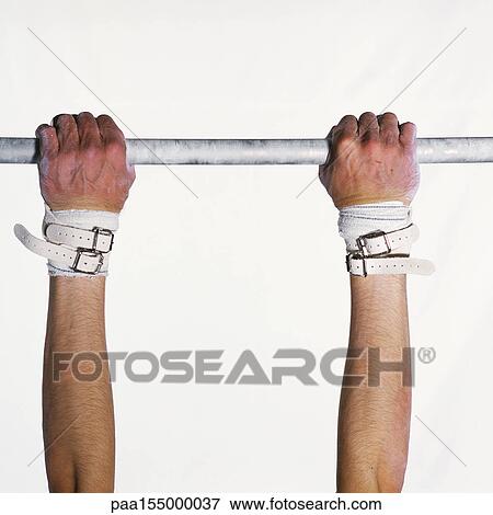 Gymnast grasping bar, close-up. View Large Photo Image Stock Photo - Gymnast grasping bar, close-up.. Fotosearch