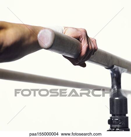 Gymnast's hand grasping parallel bar, close-up View Large Photo Image Picture - Gymnast's hand grasping parallel bar, close-up. Fotosearch
