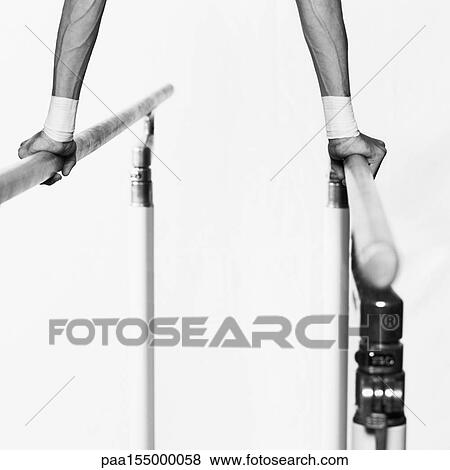 Male gymnast hand's on parallel bars, close-up, b&w. View Large Photo Image Stock Photo - Male gymnast hand's on parallel bars, close-up, b&w.. Fotosearch