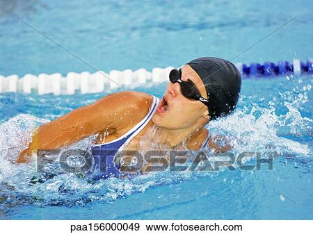 Female swimmer taking breath, close-up View Large Photo Image Stock Photo - Female swimmer taking breath, close-up. Fotosearch