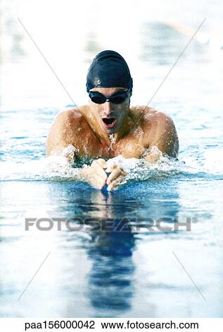 Male athlete swimming breaststroke, close-up View Large Photo Image Stock Image - Male athlete swimming breaststroke, close-up. Fotosearch