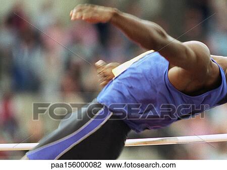 Male high jumper clearing bar View Large Photo Image Stock Image - Male high jumper clearing bar. Fotosearch