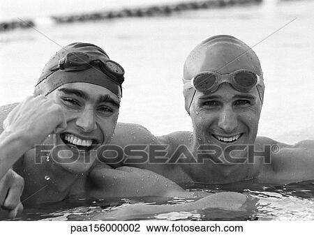 Male swimmers in water, close-up, b&w View Large Photo Image Stock Image - Male swimmers in water, close-up, b&w. Fotosearch