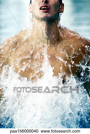 Man emerging from water, close-up View Large Photo Image Stock Image - Man emerging from water, close-up. Fotosearch