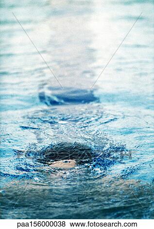 Stock Photo - Man under water, close-up. Fotosearch