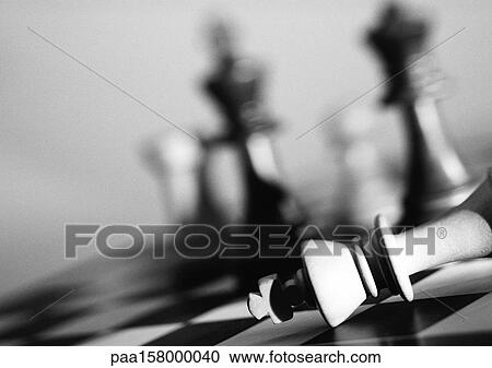 Chess pieces on chessboard, b&w. View Large Photo Image Stock Image - Chess pieces on chessboard, b&w.. Fotosearch
