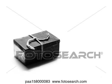 Metal box tied with string, b&w. View Large Photo Image Stock Image - Metal box tied with string, b&w.. Fotosearch