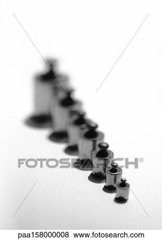 Row of weights, b&w. View Large Photo Image Stock Photo - Row of weights, b&w.. Fotosearch