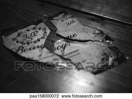 Torn wine label, close-up, b&w. View Large Photo Image Stock Image - Torn wine label, close-up, b&w.. Fotosearch