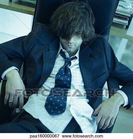 Picture of Young disheveled man sitting. paa160000067 - Search Stock ...